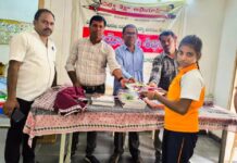 Tie belts, Slates, notebooks, color pencils distributed to students in a divine manner