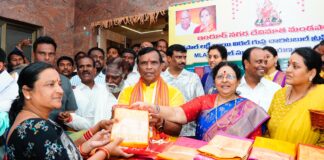 Urban MLA distributes silk sarees to Devi Mata Mandapalas