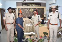 CP presents raincoats to district home guards personnel
