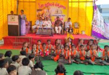 Children impressed with the antyakshari of Gita verses